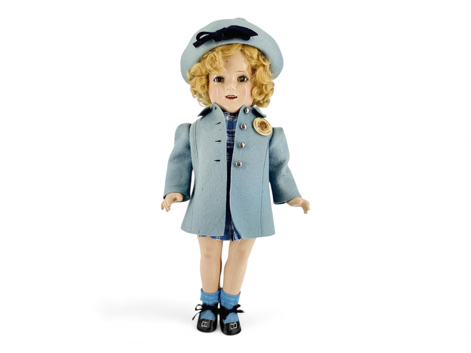 Ideal "Shirley Temple".: Ideal "Shirley Temple". 18" composition doll with mohair wig, sleep eyes with eyelashes, open mouth with teeth, on five-piece body. Doll wears a blue plaid seersucker dress, undergarmen