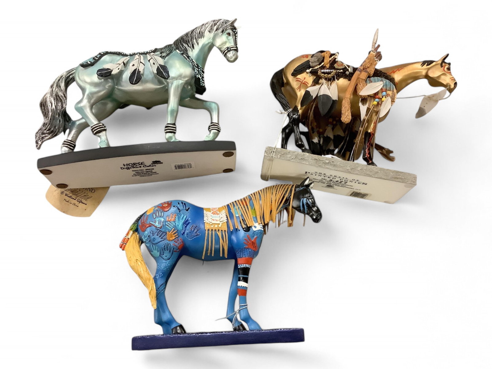 The Trail of Painted Ponies and Horse of a Different Color (3): The Trail of Painted Ponies and Horse of a Different Color (3) 20358 Winter Spirit (with box). 1549 Medicine Horse. 1547 Blue Medicine.