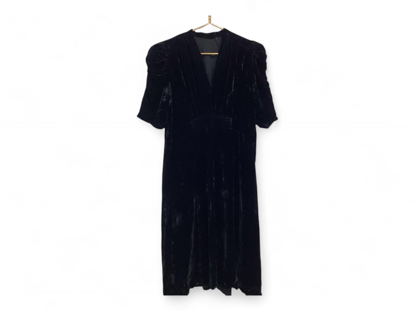 Vintage Black Velvet Dress: Vintage Black Velvet Dress V neck with ruched shoulders annd sleeves and at high waist. A line skirt. Has belt loops but no belt. Some damage. 15" across back at shoulders, 44" neck to hem.