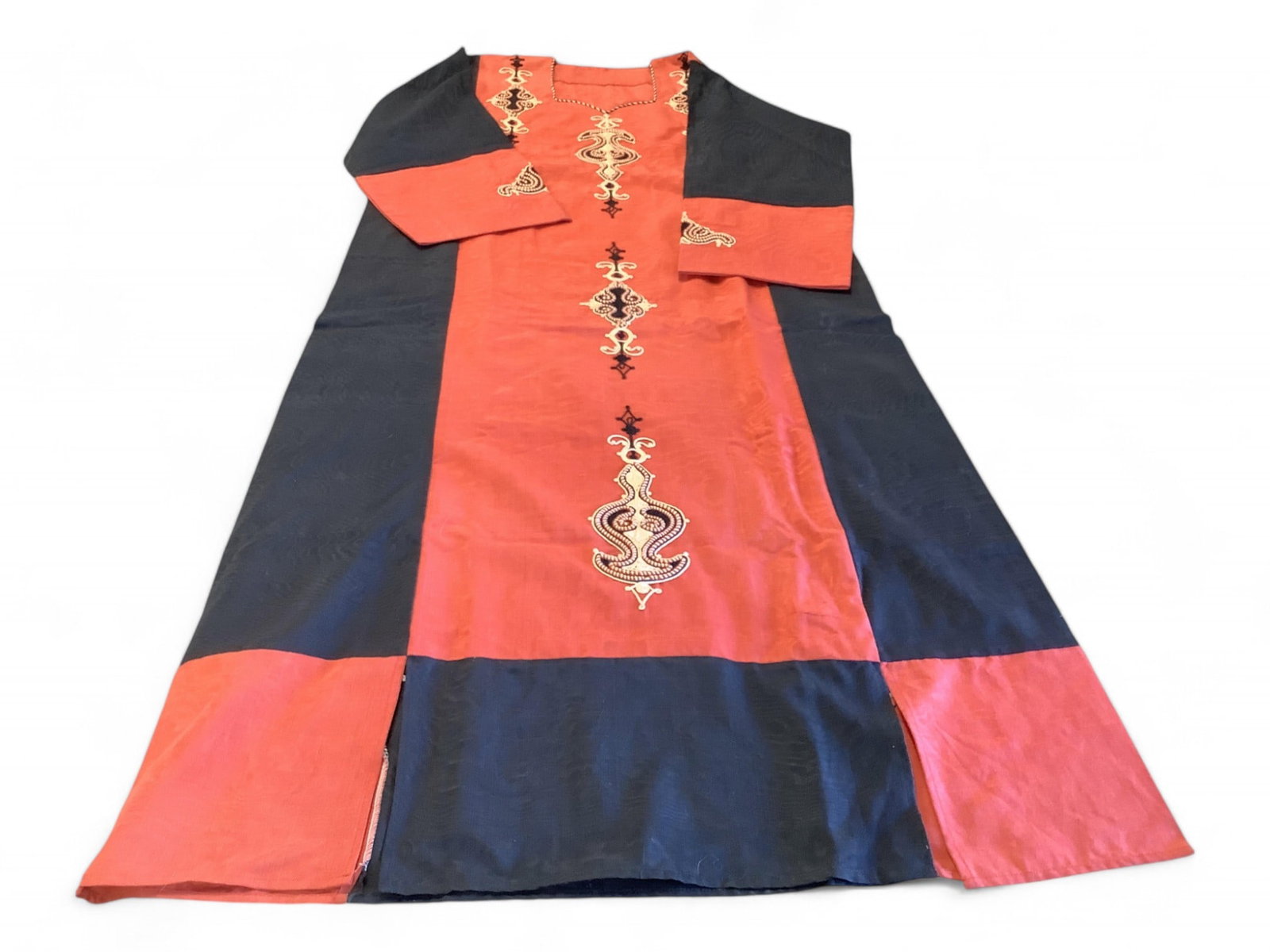 Embroidered Robe Dashiki: Embroidered Robe Dashiki Block style machine constructed with some hand stitched cording. Sleeve Shoulder to cuff is 23" Neck to hem is 56"