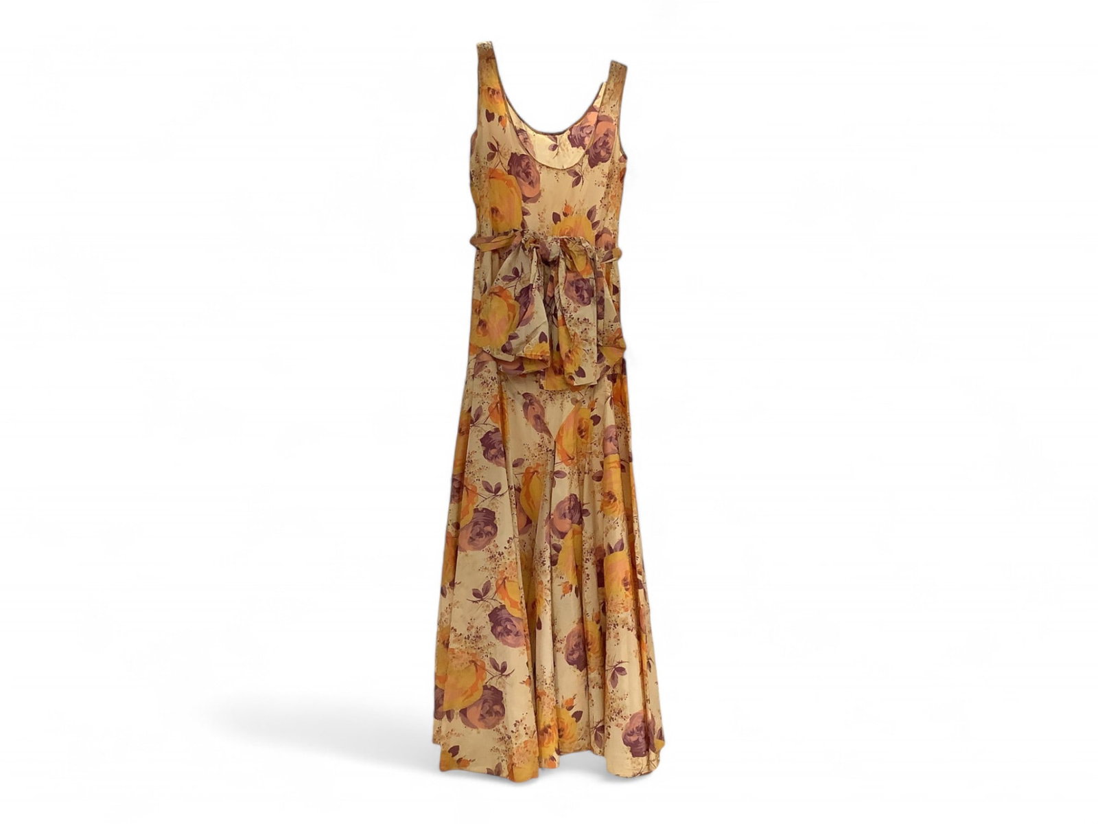 Floral Spring Dress: Floral Spring Dress Satin dress in shades of purple, orange and yellow with cream background. Dress has side snaps and attached bow.