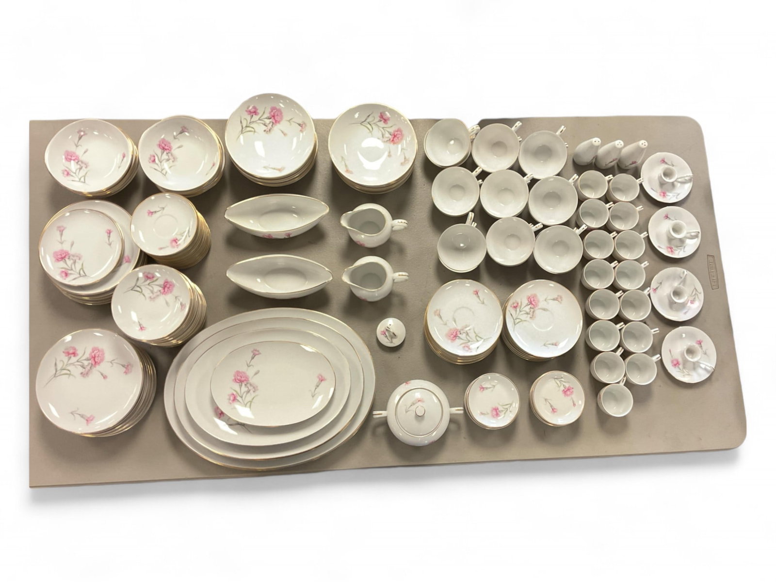 Huge Set of Carnation Dishes Smallest cups measure 2" tall, largest platter measures 16" long.: Huge Set of Carnation Dishes Identified as manufactured by Royal Court Japan and includes 15-20 of most items plus small to large serving platters. Smallest cups measure 2" tall, largest platter measu