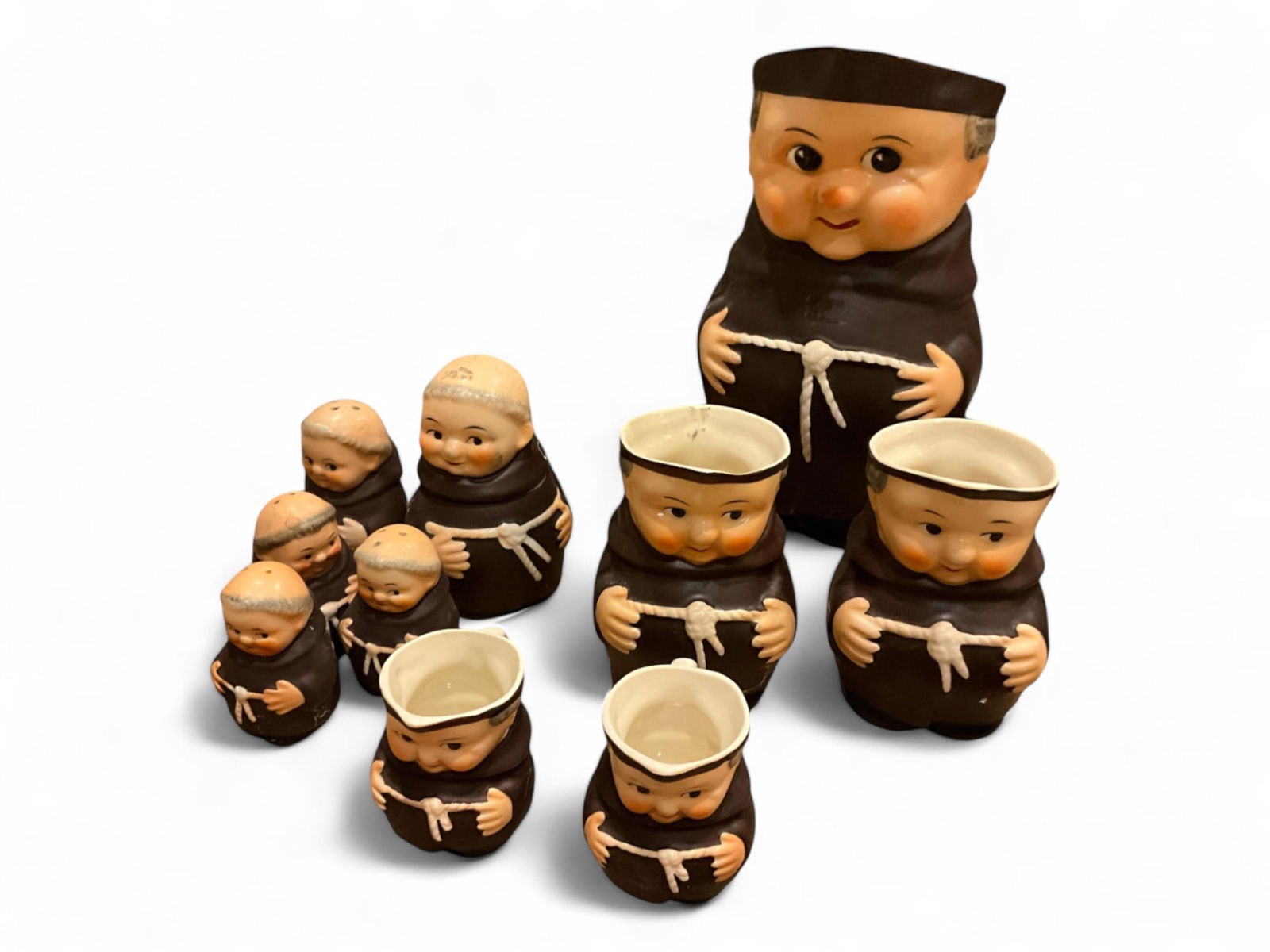 Goebel Friar Monk Serveware: Goebel Friar Monk Serveware7.75" Pitcher, (2) Creamers, (1) sugar, (2) mugs, salt and pepper shakers. Items show wear.