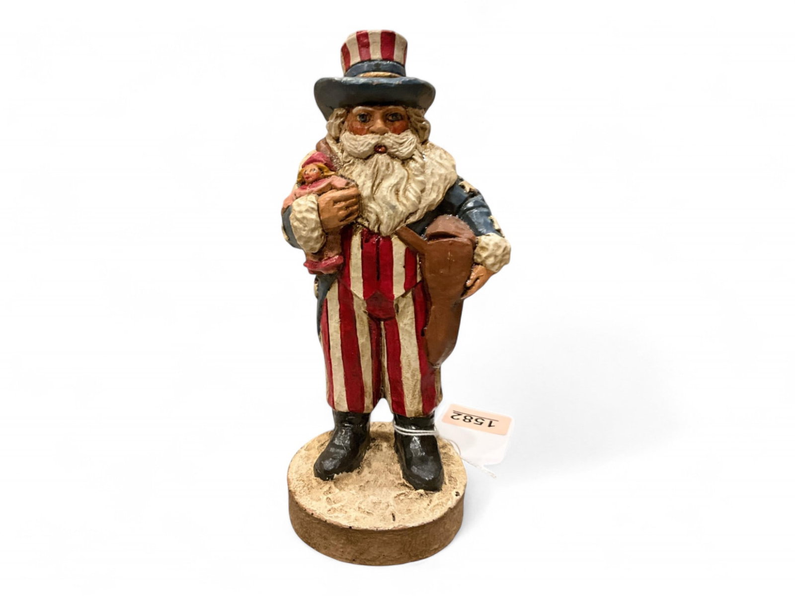 Signed Janice Doyle "U.S.A. 1915" Americana Santa Figurine 7 3/4 in. (19.7 cm.): Signed Janice Doyle "U.S.A. 1915" Americana Santa Figurine 7 3/4 in. (19.7 cm.)