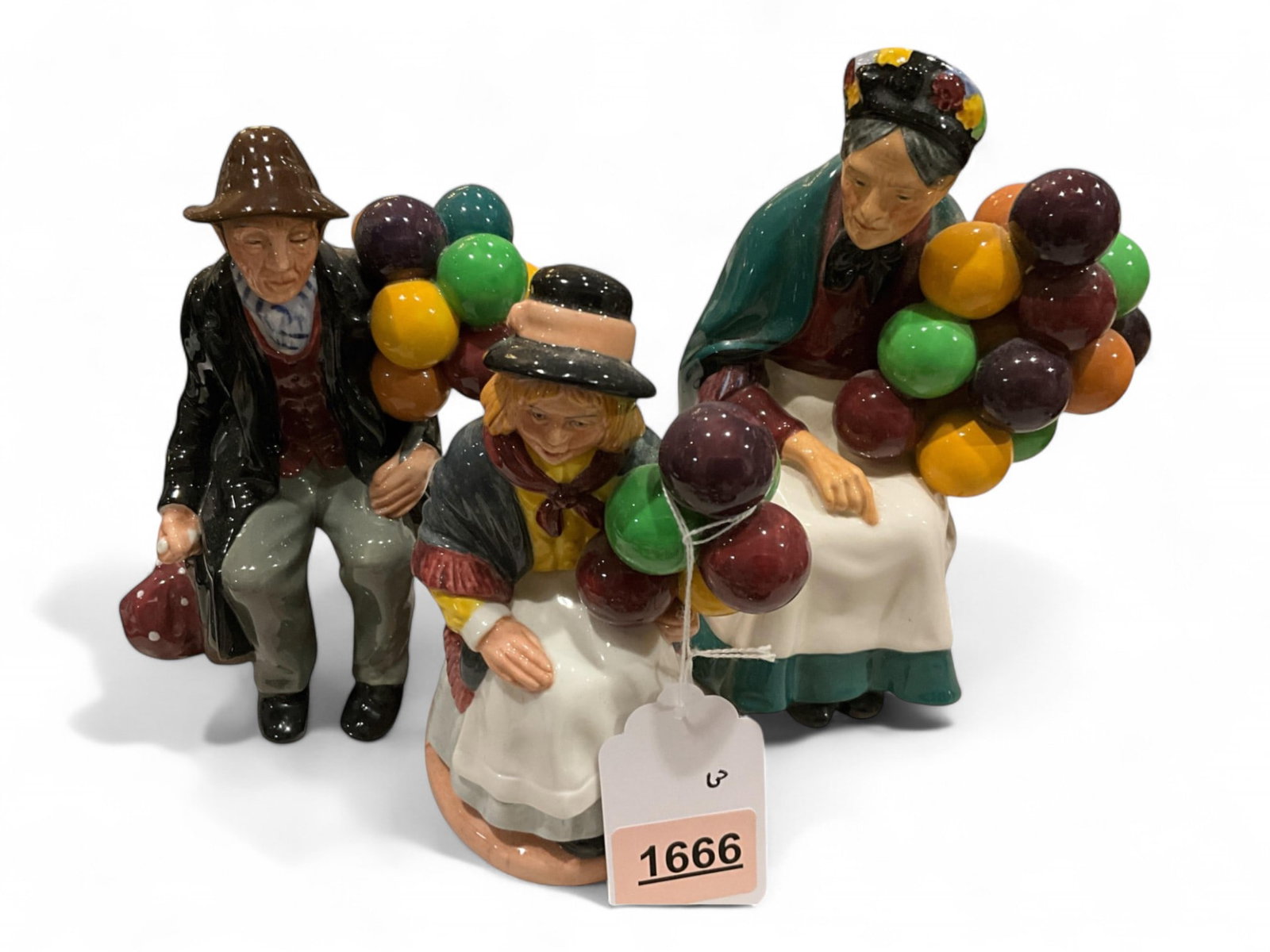 Royal Doulton Figurines: Royal Doulton Figurines (3) Balloon Man, Balloon Woman, Balloon Girl. 6.5" - 7.5".