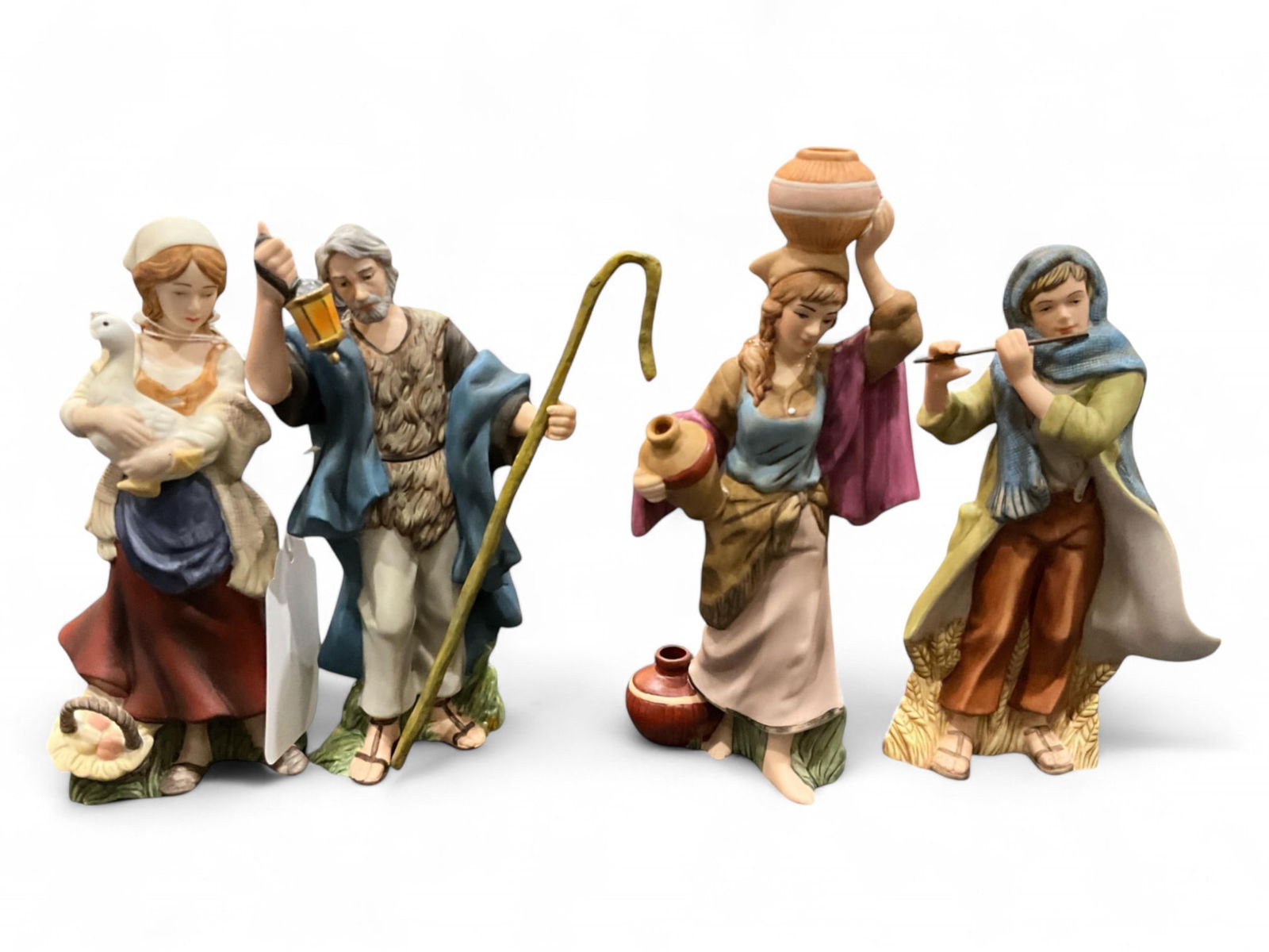 2002-2003 Thomas Kinkade's Nativity Collection "Townspeople of the Nativity": 2002-2003 Thomas Kinkade's Nativity Collection "Townspeople of the Nativity"Lighting the Way, Bountiful Water Barer, Song of Peace Musician, Humble Peasant Maiden.