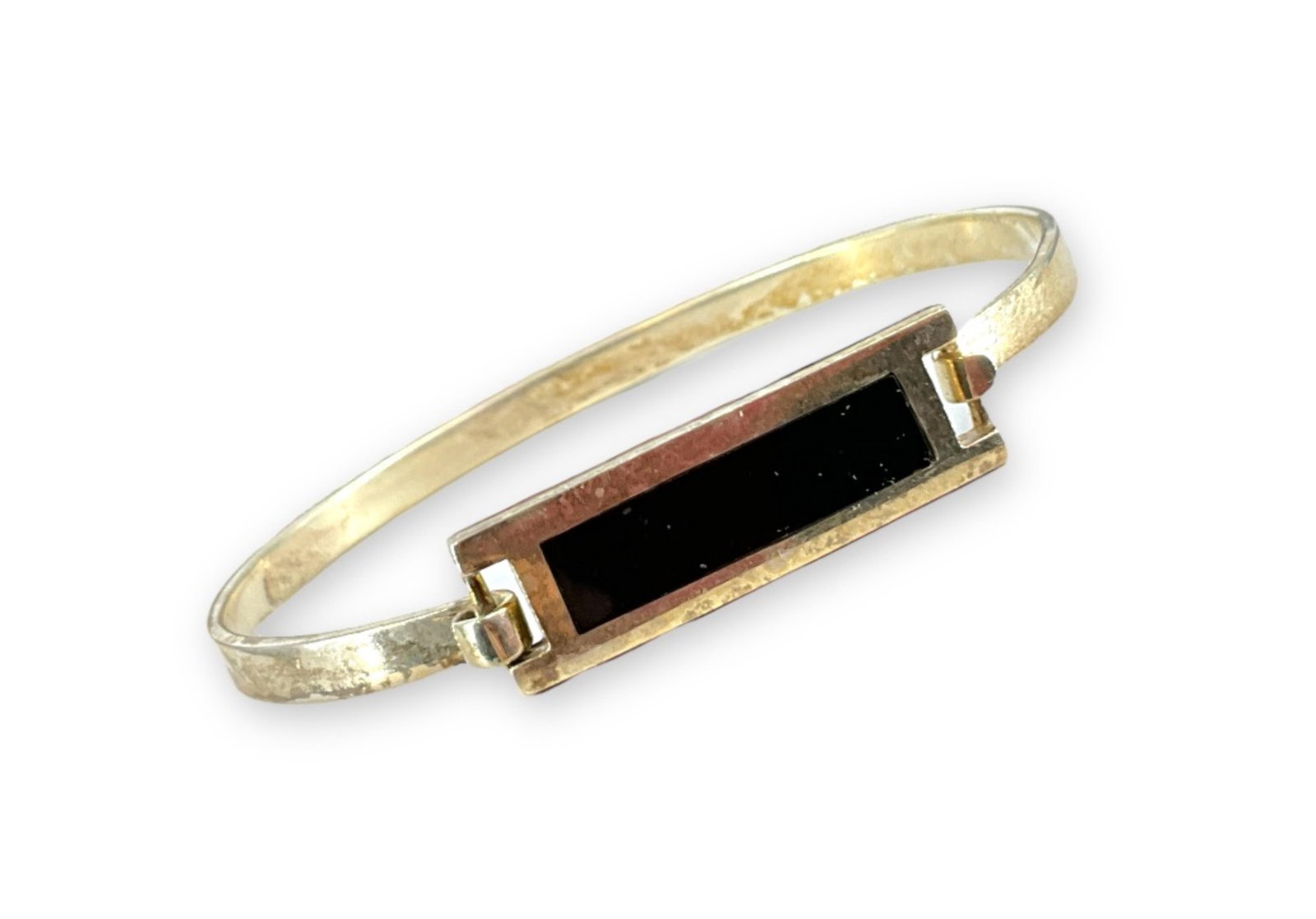 Sterling Silver Bracelet: Sterling Silver Bracelet Hook clasp closure, polished finish with onyx inlay (2.23") inner diameter (0.40 troy oz tw).