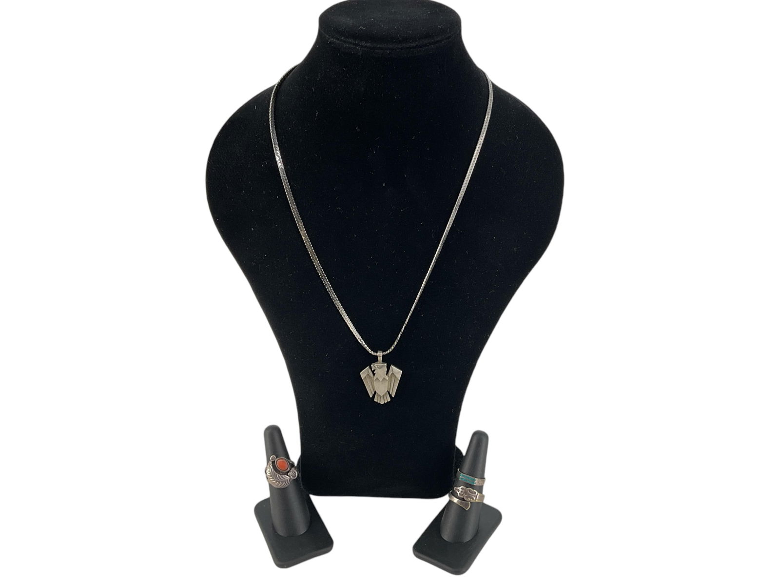 Silver-Tone Thunderbird Necklace and Three Silver Rings (1 of 10)
