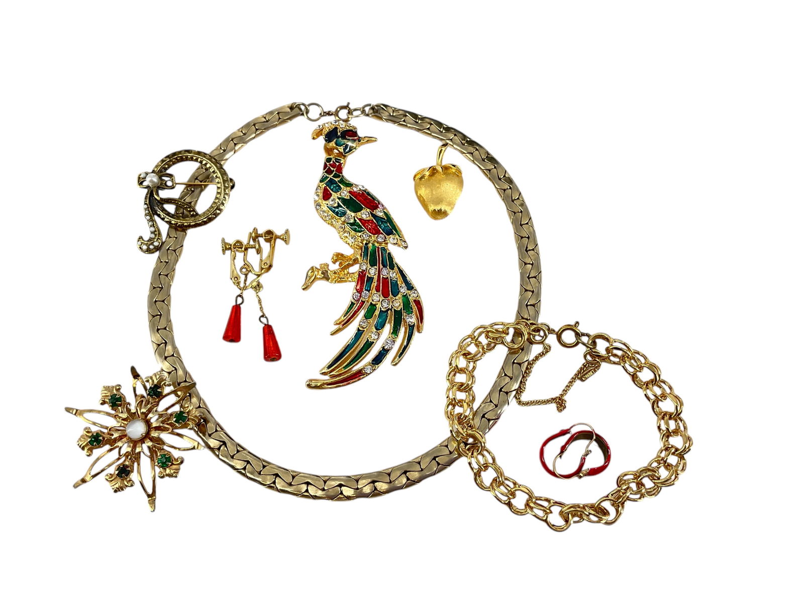 En Tremblant Gold-Tone Bird Brooch, Signed "Monet" Chain Bracelet, Stamped "Trifari" Strawberry Pin: En Tremblant Gold-Tone Bird Brooch, Signed "Monet" Chain Bracelet, Stamped "Trifari" Strawberry Pin and MoreLarge brooch is styled as a bird in gold-tone metal with vivid green and red enamel and diam