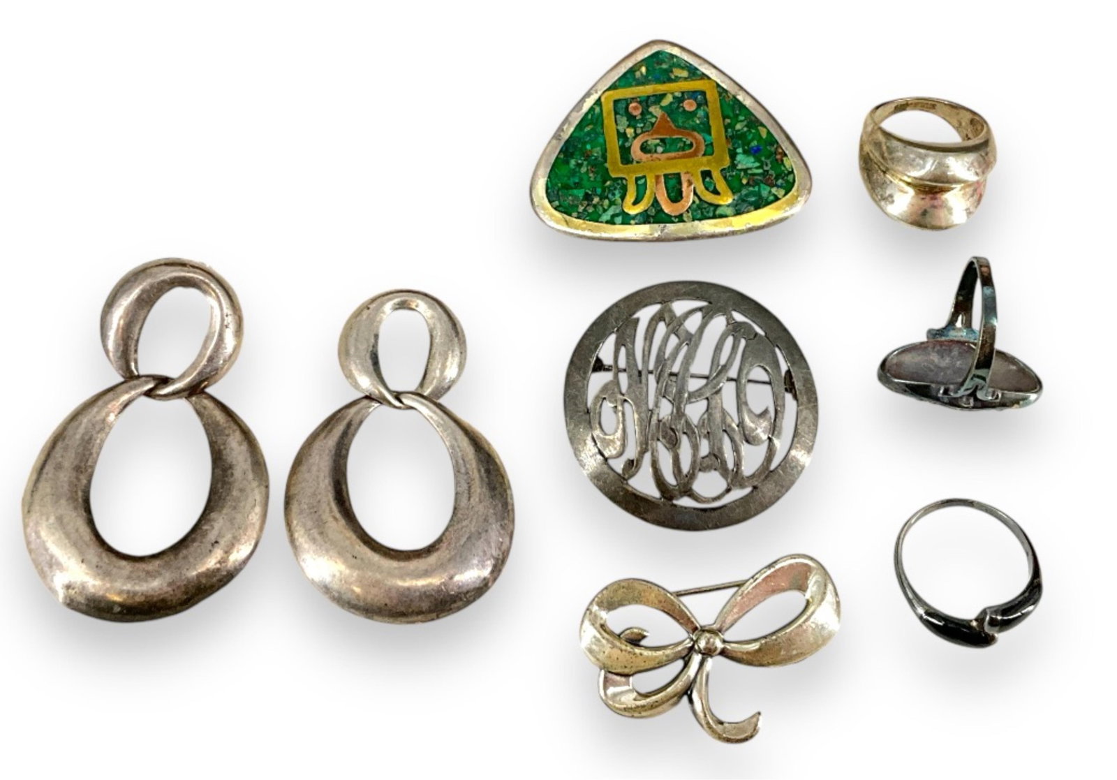 Sterling Accessories & Scrap: Sterling Accessories & Scrap All sterling accessories, post back drop earrings - one broken, monogram brooch, 1.5" bow pin, size (6.75) polsihed tapered shank ring, size (8.5) bypass shank ring, size 