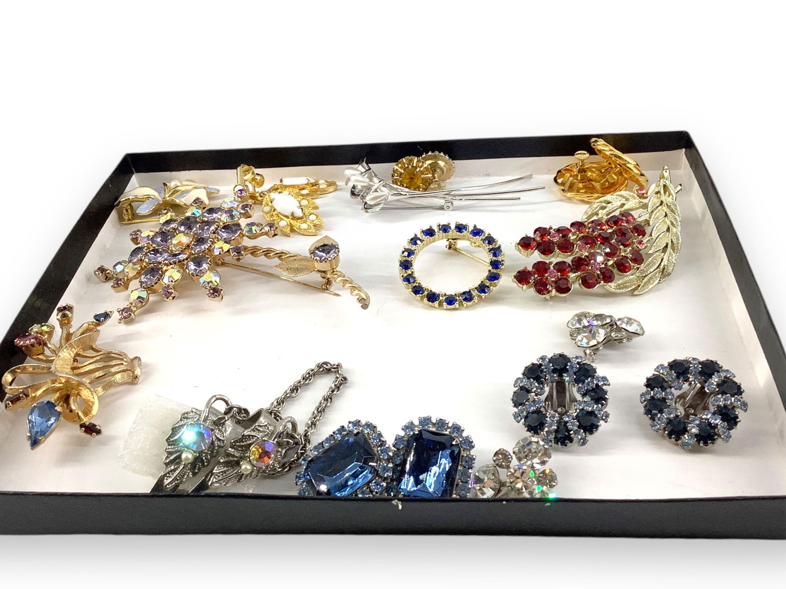 Beautiful Vintage Fashion Brooches and Earrings: Beautiful Vintage Fashion Brooches and EarringsLot has a large 4" tall gold-tone brooch with a lavender and iridescent crystal studded flower, a pair of signed "Coro" screw-back earrings with orange f