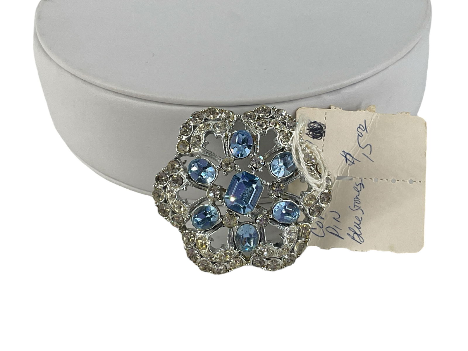 Vintage Coro Brooch: Vintage Coro BroochSigned on reverse, blue and clear crystals measuring up to 10mm in size, no missing crystals at the time of listing, base metal backing.
