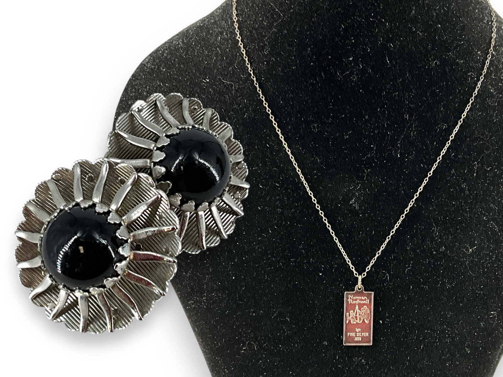 Necklace with Pendant Stamped "Norman Rockwell 1 gr. Fine Silver .999" and Sarah Coventry: Necklace with Pendant Stamped "Norman Rockwell 1 gr. Fine Silver .999" and Sarah Coventry Silver-Tone EarringsNecklace has an approx 16" tested silver chain which holds an approx 1" tall pendant which