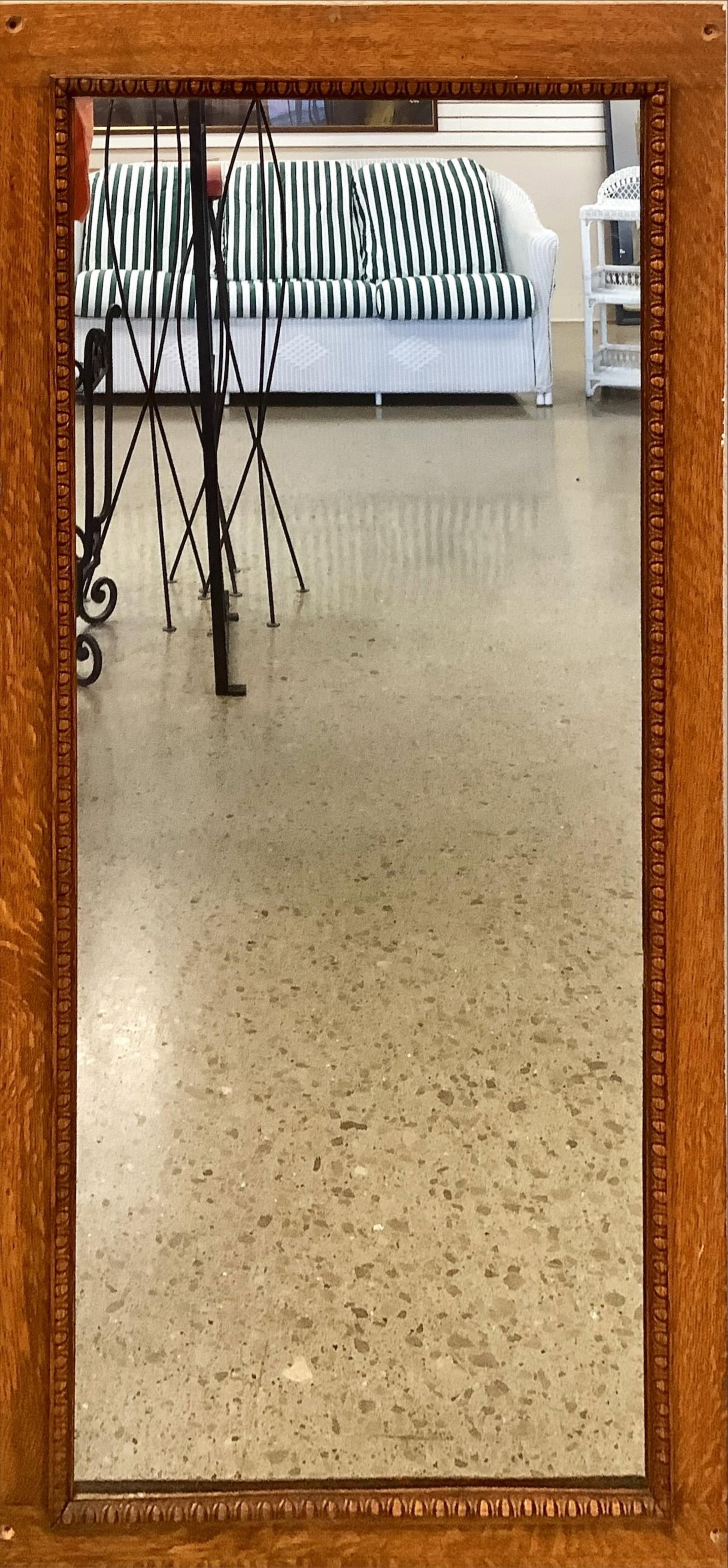 Wooden Frame around Mirror Measures 22.5" x 45.5".: Wooden Frame around Mirror The frame has a nice detail on the inner edge. Measures 22.5" x 45.5".