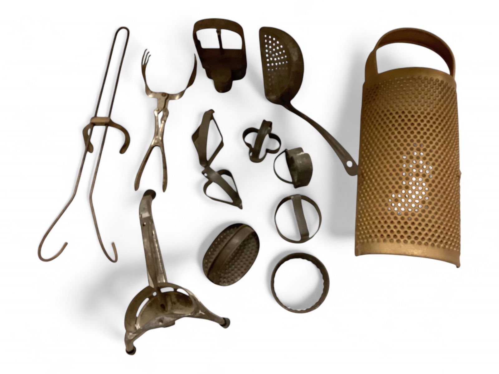 Misc Antique Kitchenware Height ranges .25" to 16.5": Misc Antique KitchenwareMisc Antique Kitchenware: including cookie cutters, graters, and shredderHeight ranges .25" to 16.5"