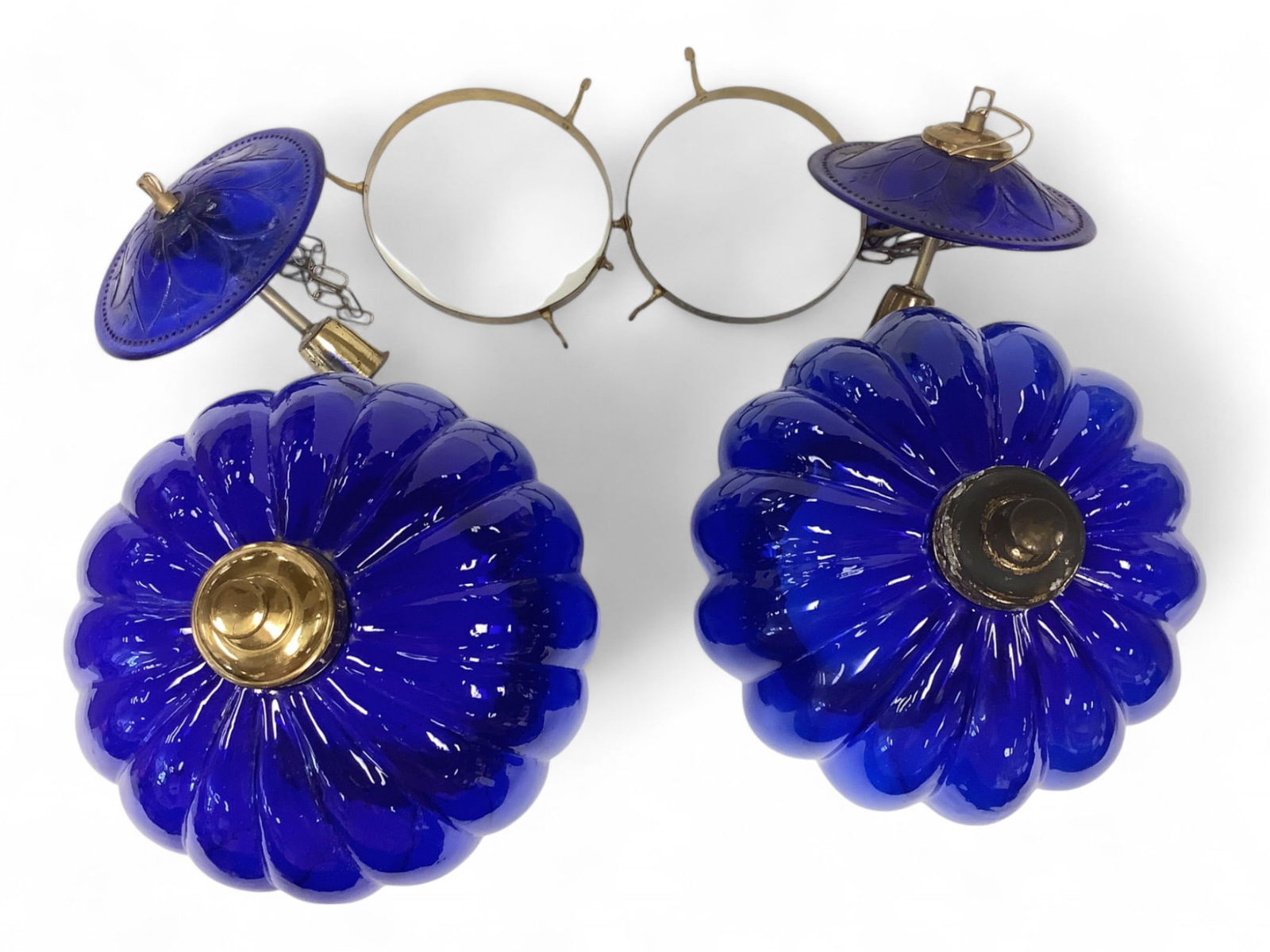 Pair of Blue Glass Hanging Lamps Measures 11" tall.: Pair of Blue Glass Hanging LampsMeasures 11" tall.