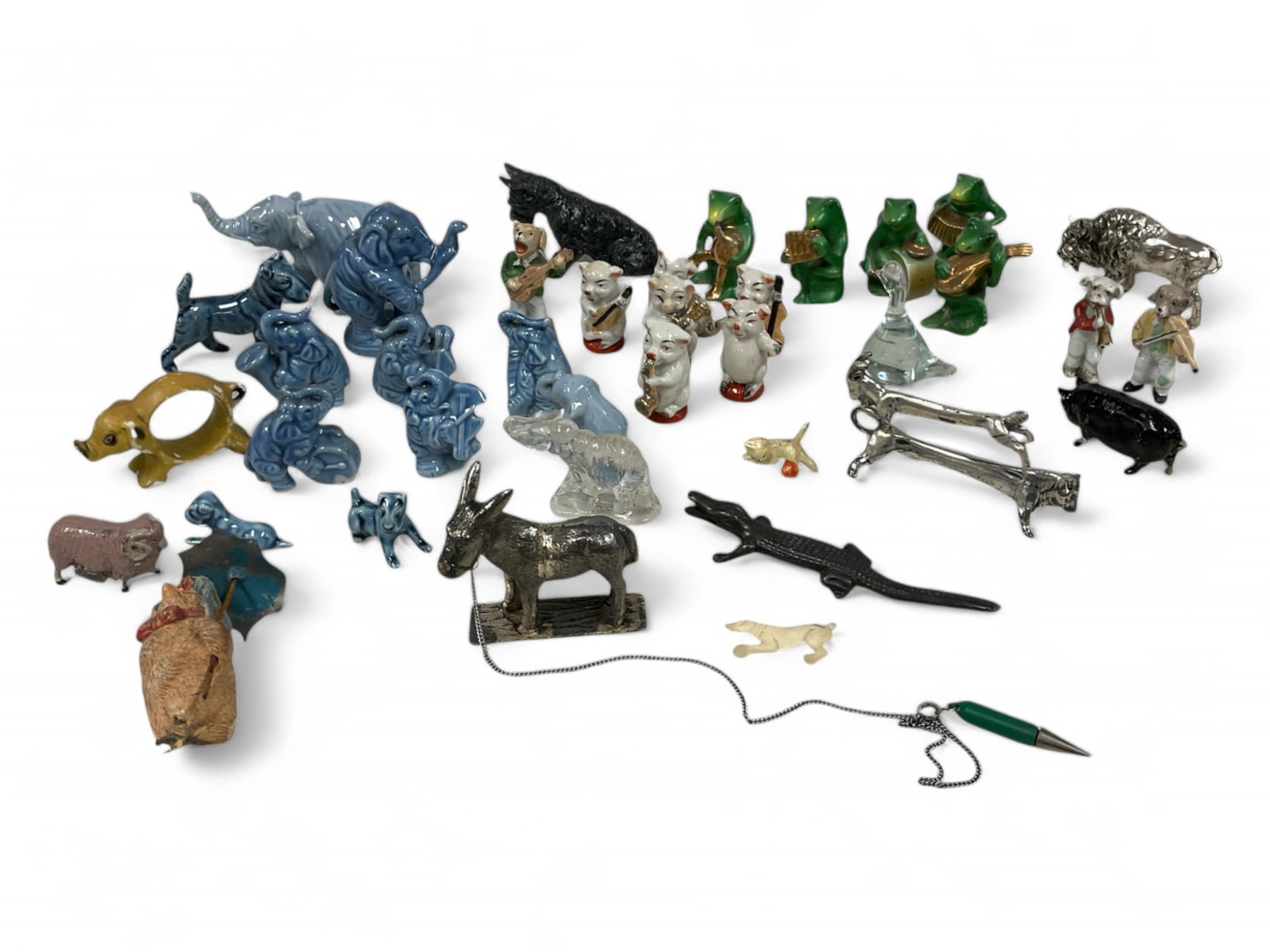 Collection of Small Figurines: Collection of Small Figurines Approximately 38 porcelain, glass and silverplate figures, including a donkey pencil holder (2.5" long x 3" tall).