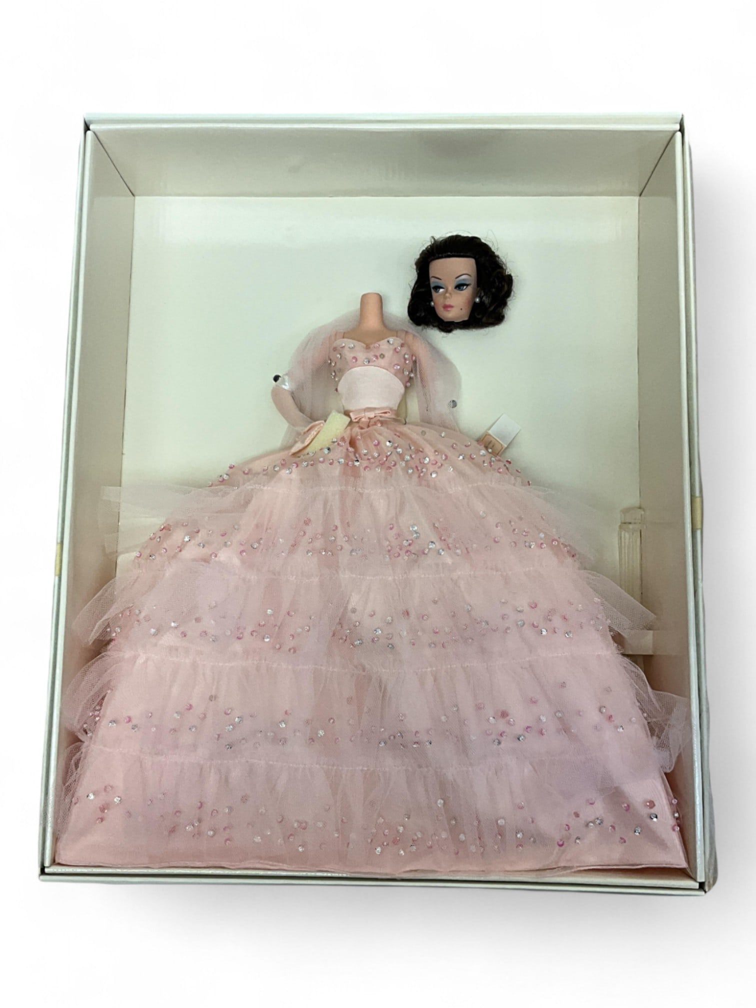 Silkstone LE "In the Pink" LE Barbie Fashion Model, 27683 - Needs Repaired: Silkstone LE "In the Pink" LE Barbie Fashion Model, 27683 - Needs RepairedBarbie's head needs repaired. Once repaired, Barbie is dressed to attend an elegant ball.She looks stunning in a breathtaking