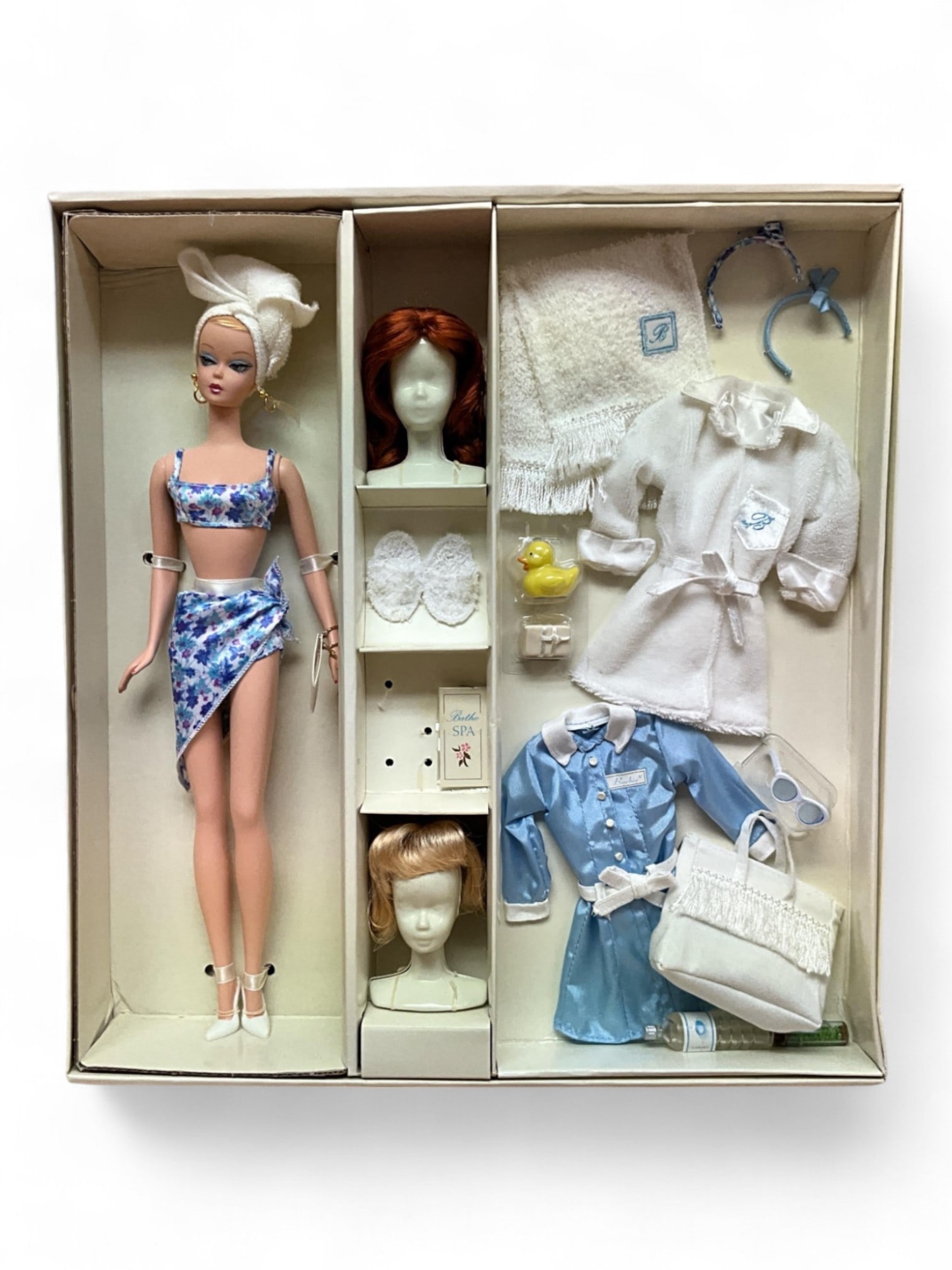 2003 Silkstone "Spa Getaway Giftset" Barbie Fashion Model, LE B1319: 2003 Silkstone "Spa Getaway Giftset" Barbie Fashion Model, LE B1319Spend an indulging day at the spa with BarbieÆ! The Spa Getaway Giftset features BarbieÆ doll dressed in a two-piece bathin