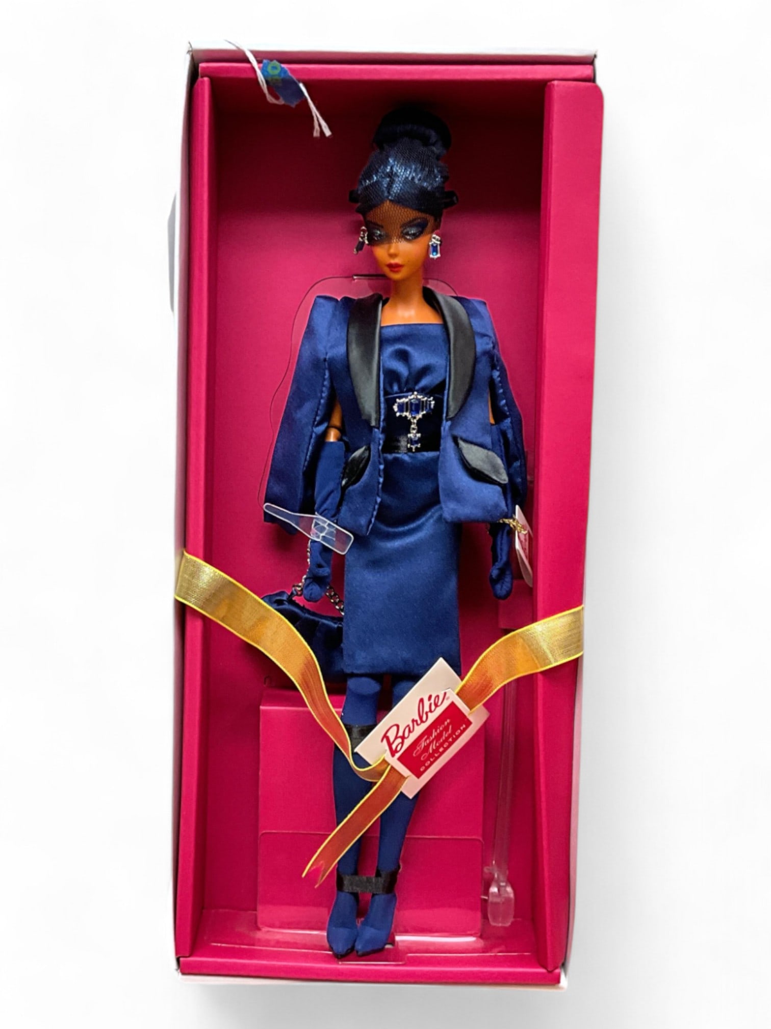 2024 Silkstone BFMC "Sapphire Anniversary" Silkstone Barbie Nib, HRM60: 2024 Silkstone BFMC "Sapphire Anniversary" Silkstone Barbie Nib, HRM60Commemorate 65 years of Barbie with a glamorous doll that also heralds the return of the beloved BFMC (Barbie Fashion Mo