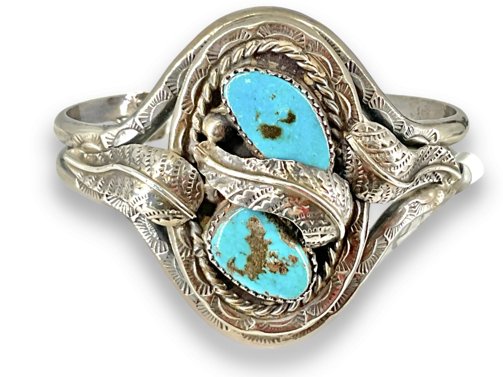 Southwestern Sterling Silver and Turquoise Cuff Bracelet: Southwestern Sterling Silver and Turquoise Cuff Bracelet Signed J. Bahe, tested sterling silver/925 composition, 1.165 troy ounces total weight, featuring traditional design motifs, with turquoise sto