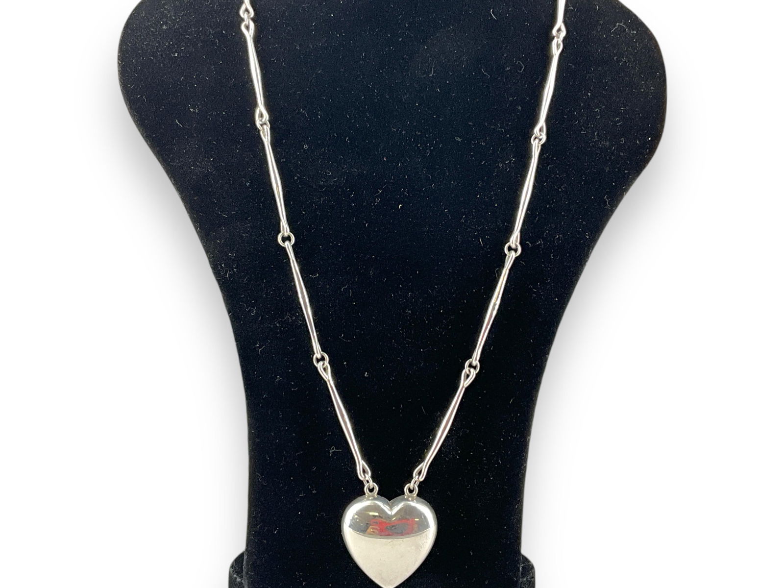 Georg Jensen Puffy Heart Necklace #126B: Georg Jensen Puffy Heart Necklace #126BThis lovely, shiny, silver puffed heart necklace is hallmarked "Georg Jensen 925 S Denmark 126B" and has an approx 24" long, bar-link chain with an attached puff