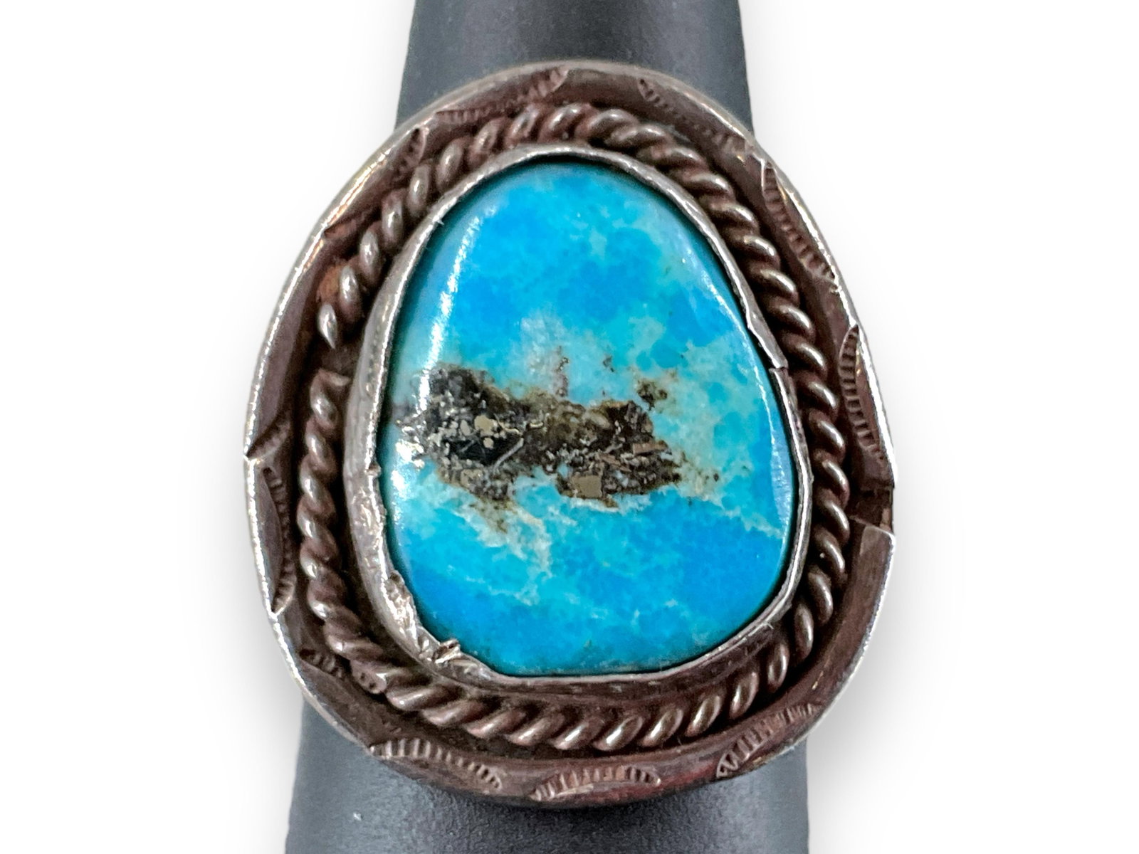 Southwestern Sterling Silver and Turquoise Stone Ring: Southwestern Sterling Silver and Turquoise Stone Ring Tested sterling silver/925, Southwestern design, size 6.75, approximately 0.30 troy ounces total weight, with natural turquoise stone solitaire at