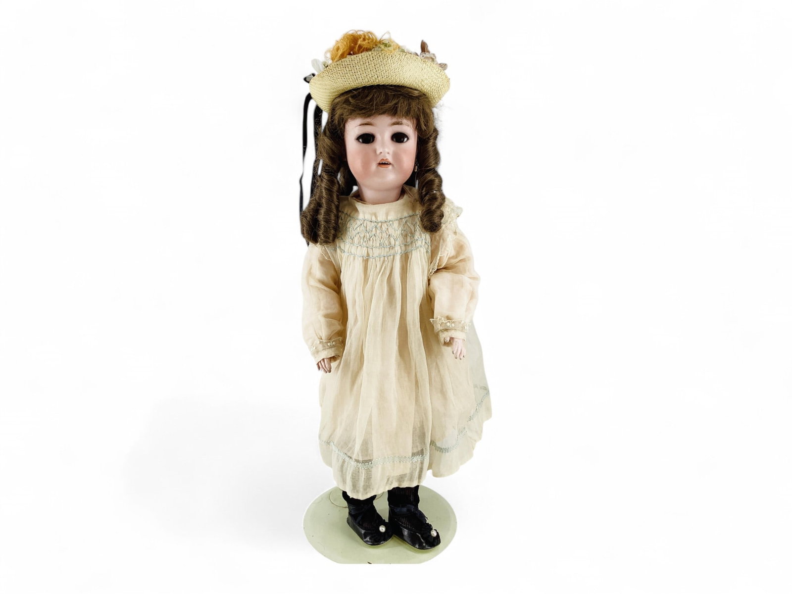 Simon & Halbig K&R bisque socket head girl.: Simon & Halbig K&R bisque socket head girl. 22" doll with replaced wig, glass sleep eyes with eyelashes, pierced ears, open mouth with teeth, jointed composition body. Missing one ear ring, has a