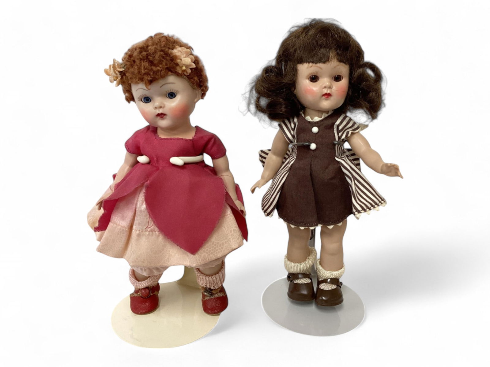 Vogue 7-1/2" Walker Doll, 7-1/2" Straight Leg Doll: Vogue 7-1/2" Walker Doll, 7-1/2" Straight Leg DollBrunette with poodle wig marked on back, tagged dress, eyes do not want to close. Painted brows & lashes, light pink dress has some light stains of da