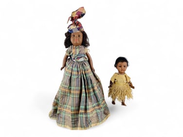 (2) Painted Bisque dolls in regional costumes.