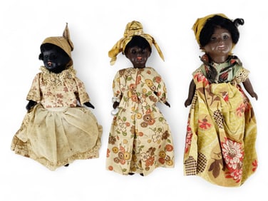 (3) Painted Bisque socket head dolls in regional costumes.