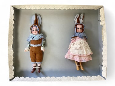 Pair German all-bisque dolls dressed as rabbits in presentation box.