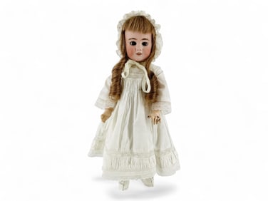 DEP "T'te Jumeau" bisque socket head girl.