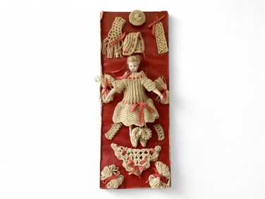 Small Bisque Shoulder Head Doll on Presentation Card.