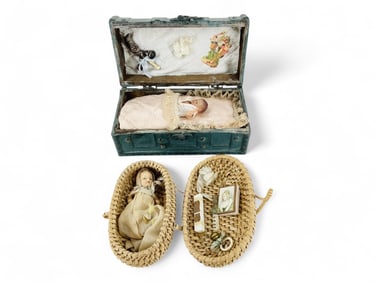(2) Small dolls in presentation boxes.