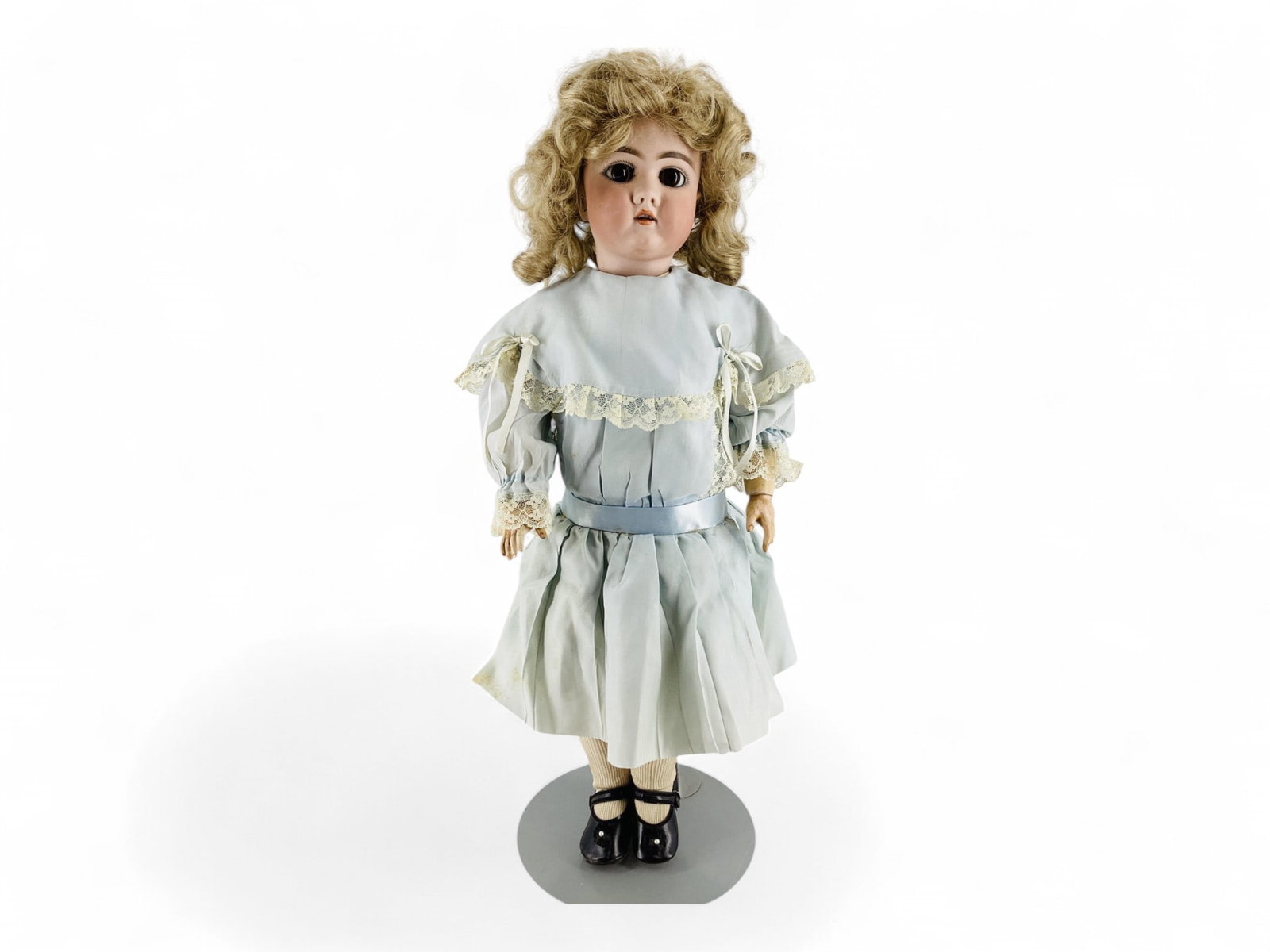 Heinrich Handwerck 109 DEP bisque socket head child.: Heinrich Handwerck 109 DEP bisque socket head child. 23" doll with replaced wig, glass sleep eyes, pierced ears, open mouth with teeth, jointed composition body, redressed. Small bisque chip lowe