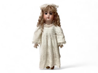 Later Jumeau bisque socket head girl.