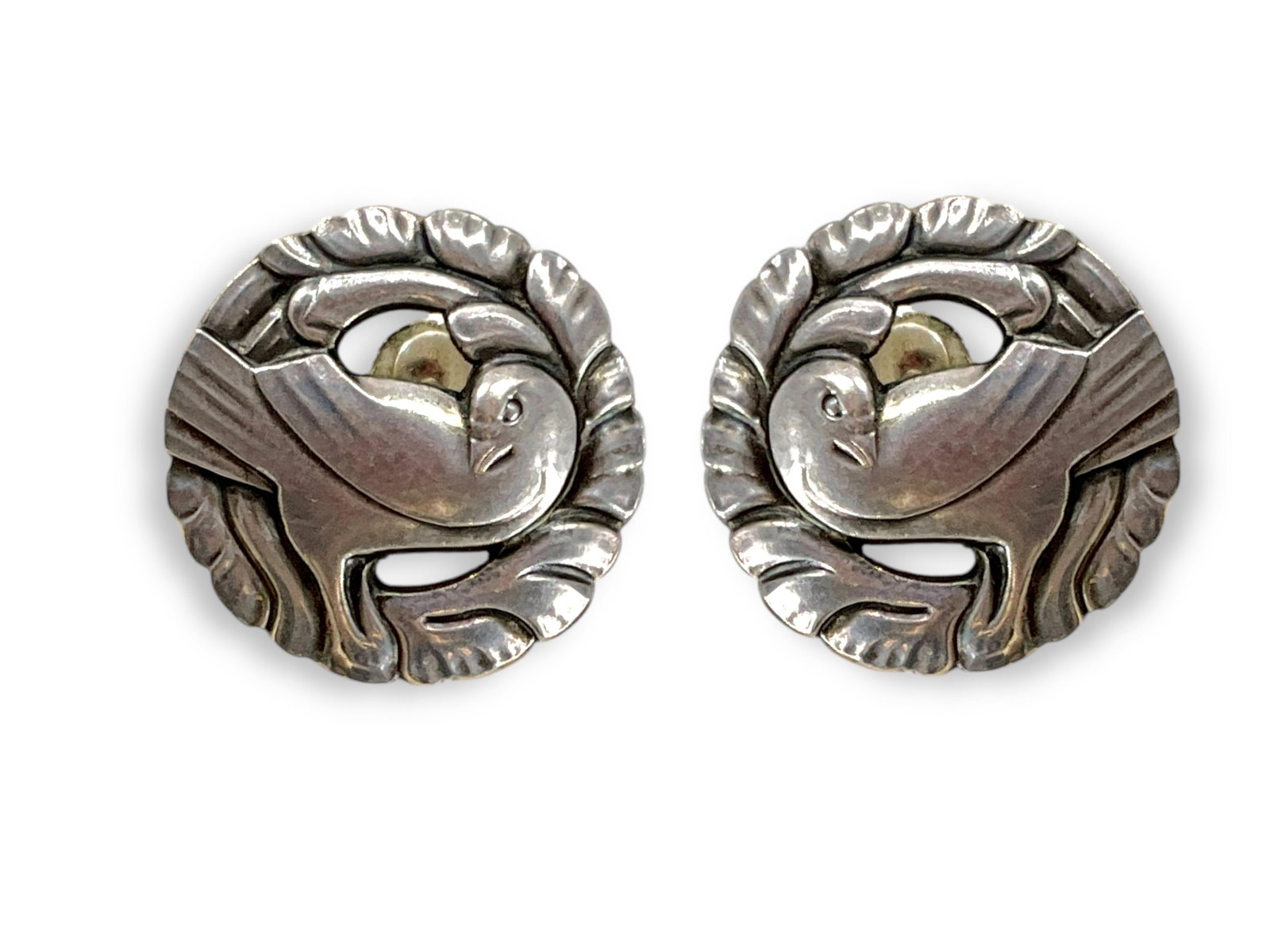 Collectible Vintage Dove Earrings by Georg Jensen #66: Collectible Vintage Dove Earrings by Georg Jensen #66 These vintage earrings are signed "Georg Jensen" & "Sterling Denmark 66" and have lovely warm patina from age. The earrings have screw-back closur