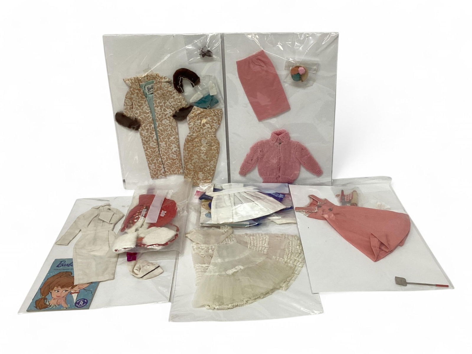 Large Lot of Vintage Barbie Outfits including Evening Splendour: Large Lot of Vintage Barbie Outfits including Evening SplendourAssorted grouping of Vintage Barbie Outfits.Some items are much better than others.The Knitting Pretty pink sweater has holes.There are s