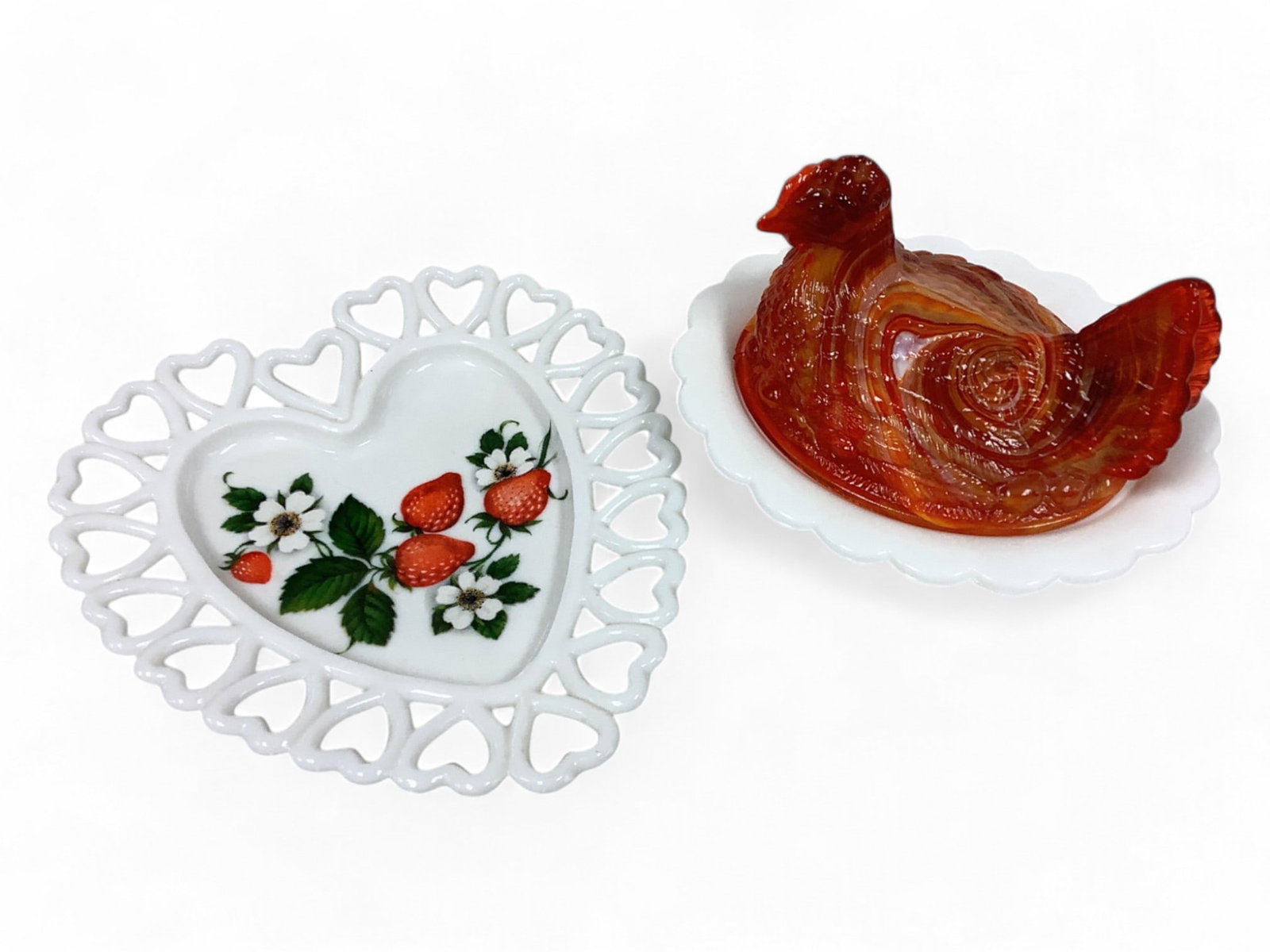 Collection of Milk Glass: Collection of Milk Glass Westmoreland reticulated heart-shaped dish with strawberries and Mosser red slag glass hen on nest on milk glass base. No visible chips or cracks.