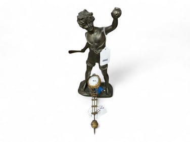 Swinger Clock w/ Boy Playing Cricket ** 16 x 7 x 4 in. (40.6 x 17.8 x 10.2 cm.)