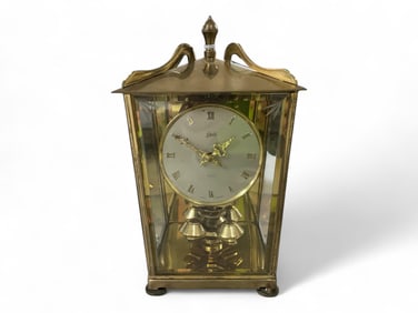 Brass Anniversary Clock by Schatz** 8 1/2 x 5 x 4 1/2 in. (21.6 x 12.7 x 11.4 cm.)