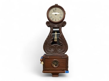 Highly Carved Wall Clock ** 33 x 11 x 4 in. (83.8 x 27.9 x 10.2 cm.)