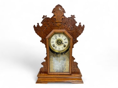 Oak Gingerbread Seth Thomas Mantle Clock ** 23 x 14 1/2 x 4 in. (58.4 x 36.8 x 10.2 cm.)