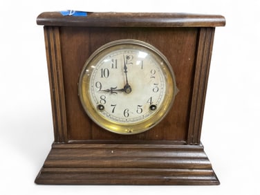 Walnut Sessions Mantle Clock** 10 x 11 x 5 1/2 in. (25.4 x 27.9 x 14 cm.)