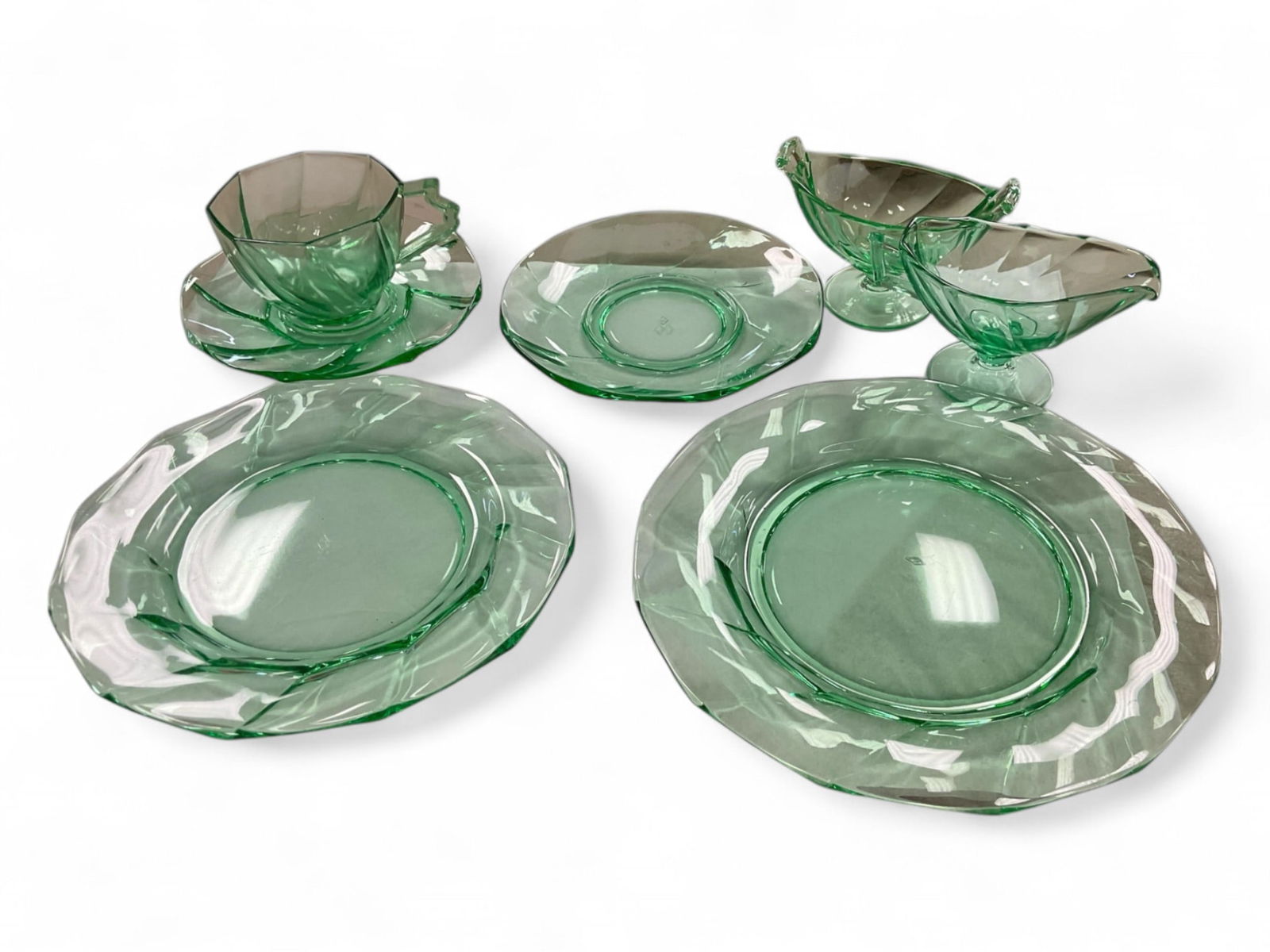 Heisey Moongleam Twist: Heisey Moongleam Twist3 cups 1 saucer 2 dessert plates, 2 salad plates 2 butter plates and 4 plates. Creamer and sugar bowl.