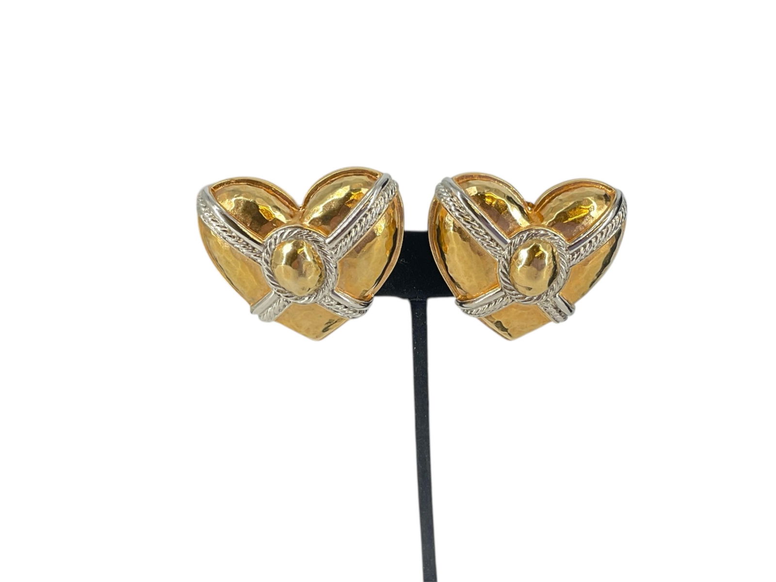 Ornate Heart Shaped Givenchy Earrings: Ornate Heart Shaped Givenchy EarringsThese large, heart-shaped clip-back earrings are created in a silver-tone accent metal and a base rosy-tone metal, are stamped "Givenchy," and are a noticeable 1 1