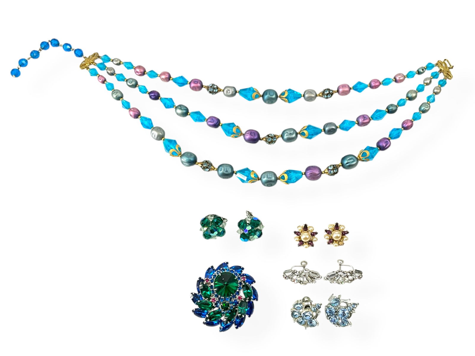 Stamped "Deauville" Vintage Necklace, Hallmarked "B. David" Rhinestone Earrings, Marked "Astra": Stamped "Deauville" Vintage Necklace, Hallmarked "B. David" Rhinestone Earrings, Marked "Astra" Earrings, "Coro" Branded Earrings and a Beautiful Blue/Green Crystal BroochLot has a triple-strand neckl