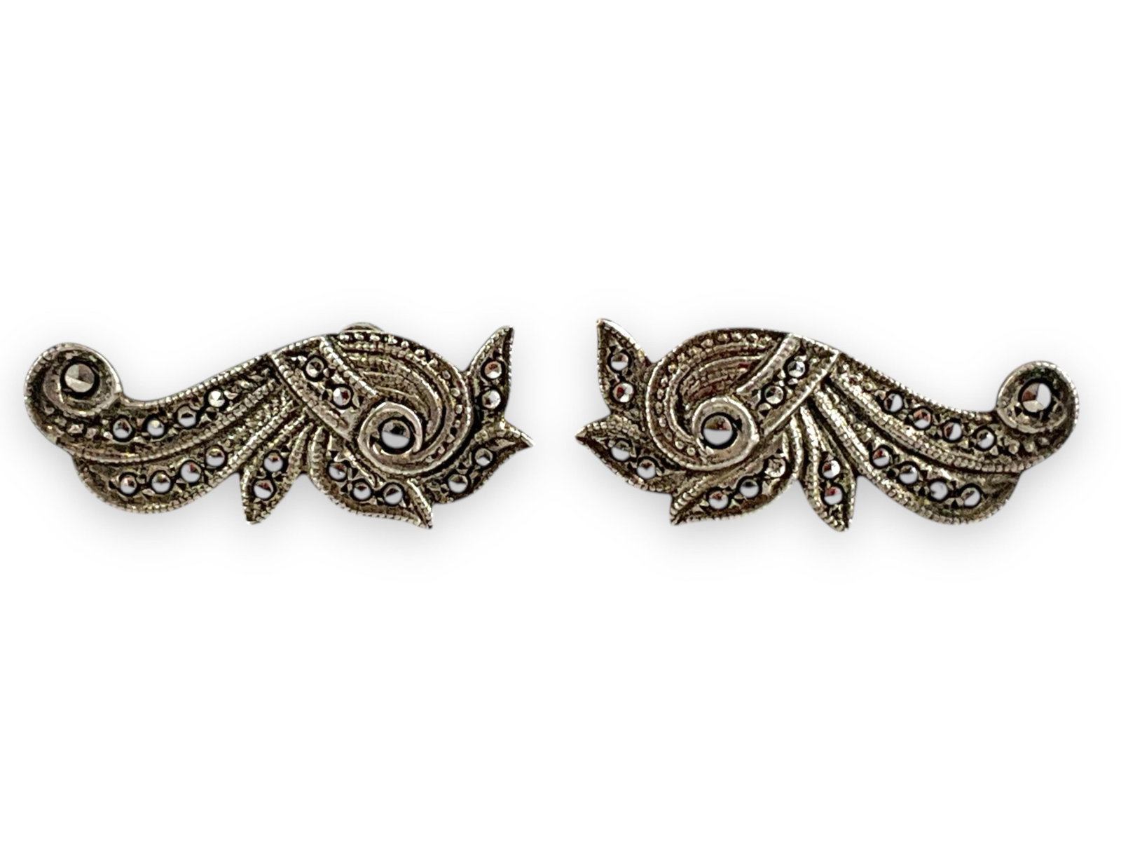Pair of Sterling Silver Earrings: Pair of Sterling Silver Earrings Screw-back closures, modern design with a Deco-style, adorned with marcasite stone accents, semi-polished metal finish, stamped and tested sterling silver/925, 27.25mm