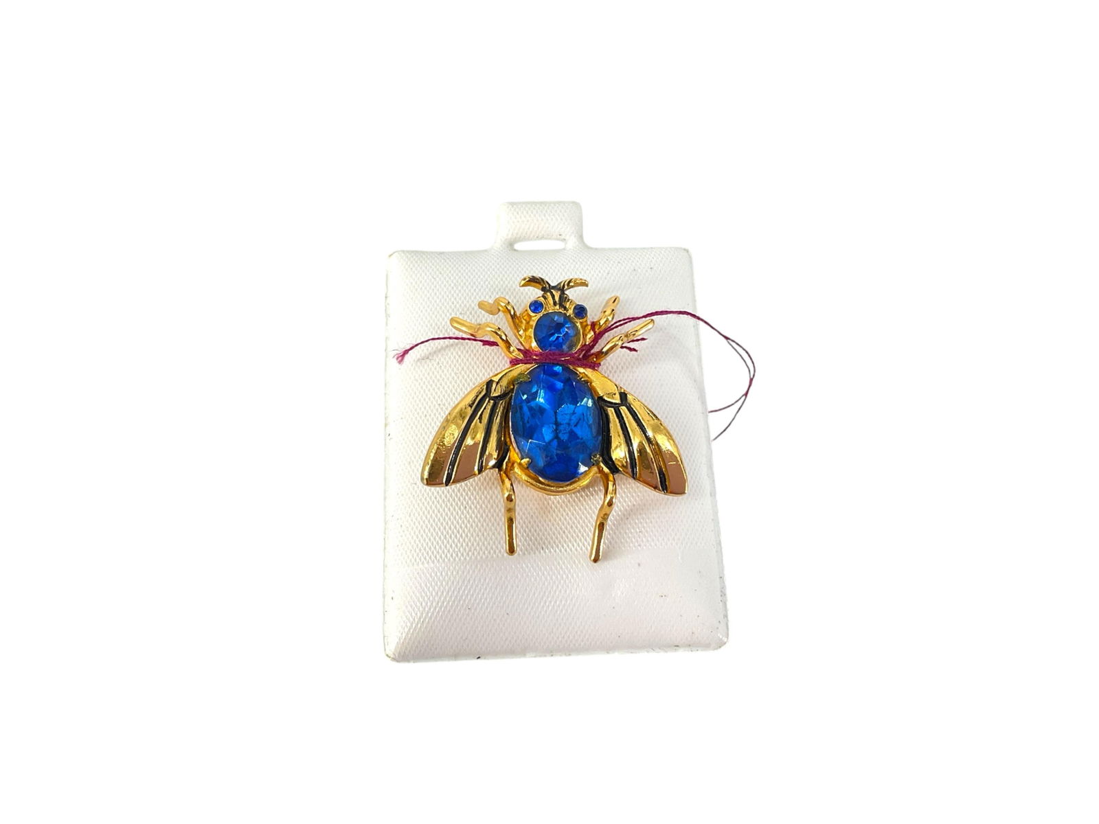 Brooch from Coro: Brooch from CoroSigned on the reverse, 32.5mm in size, base metal composition, blue crystal beads, bee motif, figural design, vintage - retro age.